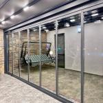 Pergola ve Sürme Camlı Cephe Panelli Kış Bahçesi