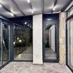 Pergola ve Sürme Camlı Cephe Panelli Kış Bahçesi