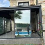 Pergola ve Sürme Camlı Cephe Panelli Kış Bahçesi